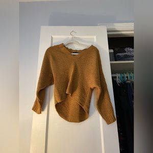 Knitted mustard-colored sweater